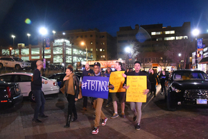 Syracuse University students march in the annual Take Back the Night protest, which aims to raise awareness about sexual assault on college campuses.