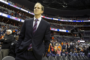 Mike Hopkins stunned many by leaving Syracuse after 22 years as an assistant coach to take a head coaching job at Washington. 